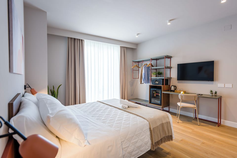 Junior Studio Suite, Balcony, Sea View | In-room safe, desk, laptop workspace, WiFi (free)
