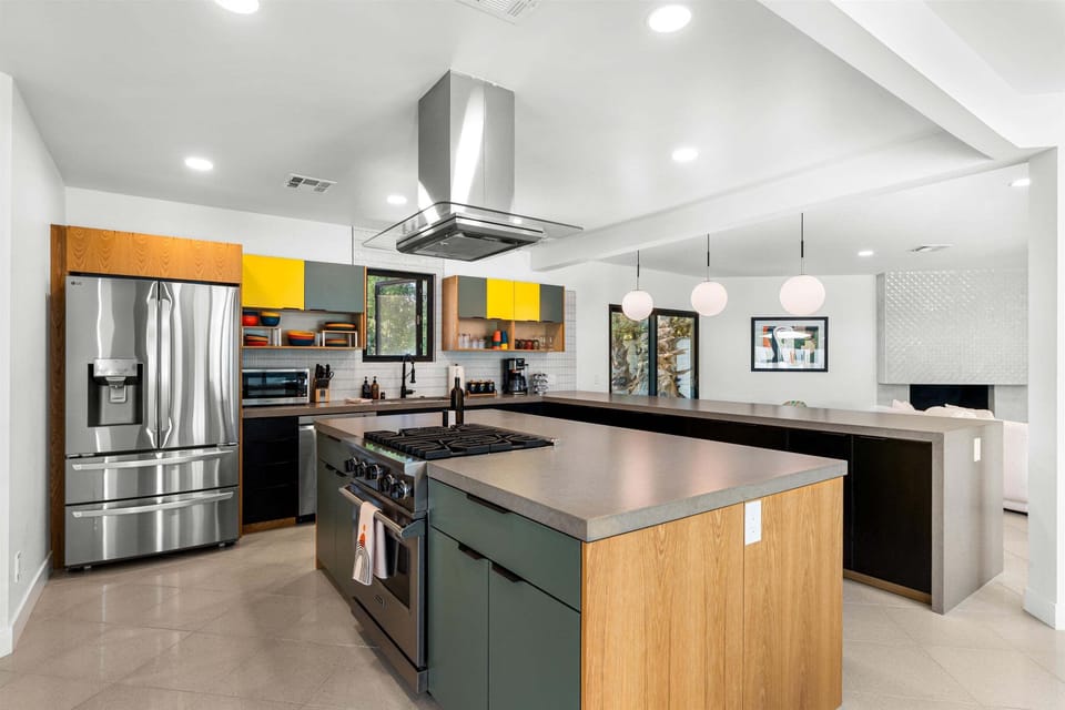 Modern kitchen with large island and stainless appliances