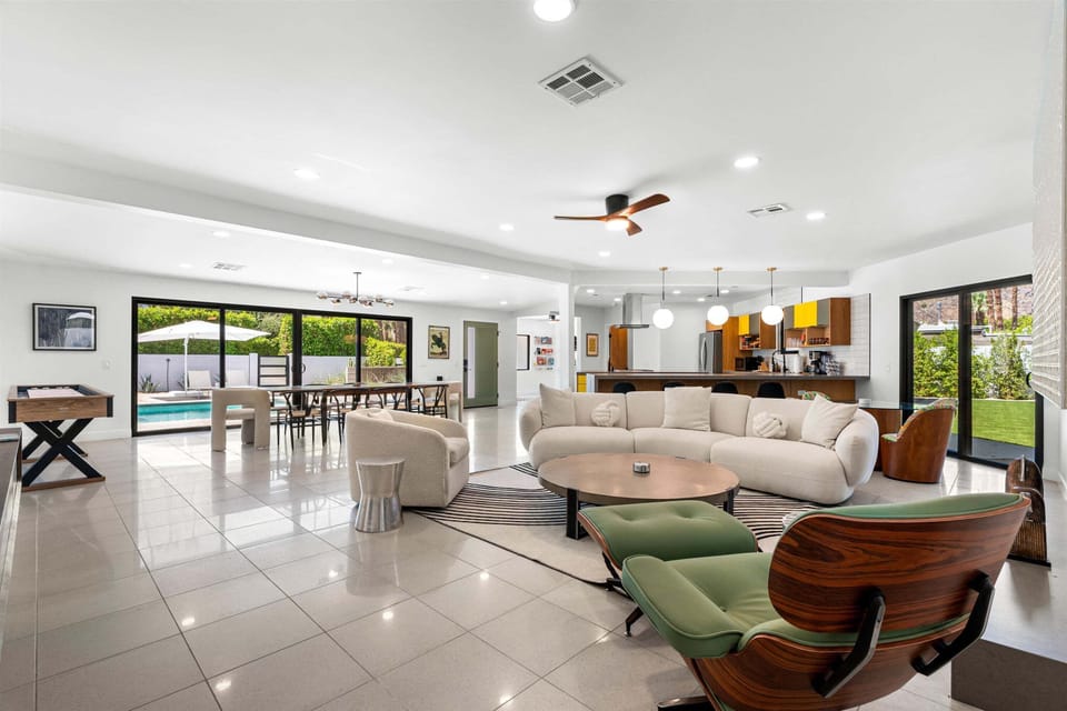 Open-concept living area with direct access to the pool