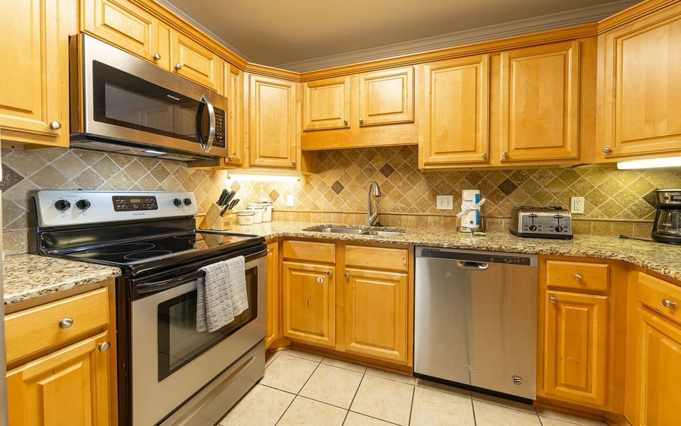 Condo, 2 Bedrooms | Private kitchen | Coffee/tea maker, fridge, oven