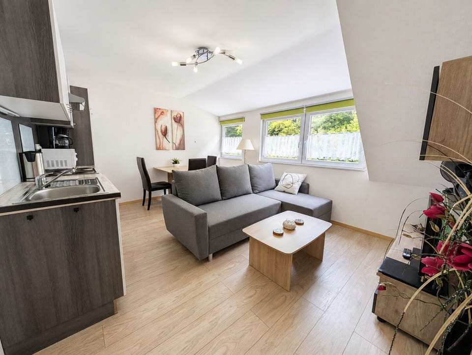 Standard Apartment, Kitchen, Garden View | Living area | 32-inch Smart TV with satellite channels