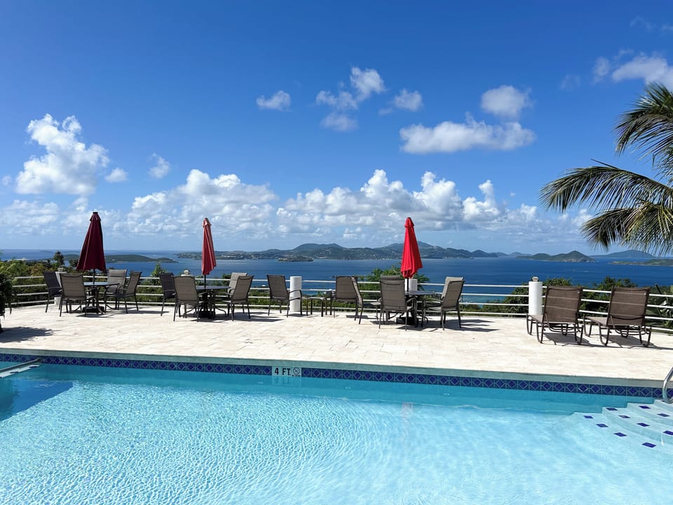 Your shared pool at Sunset Quarters has breathtaking views looking across to St Thomas and beyond