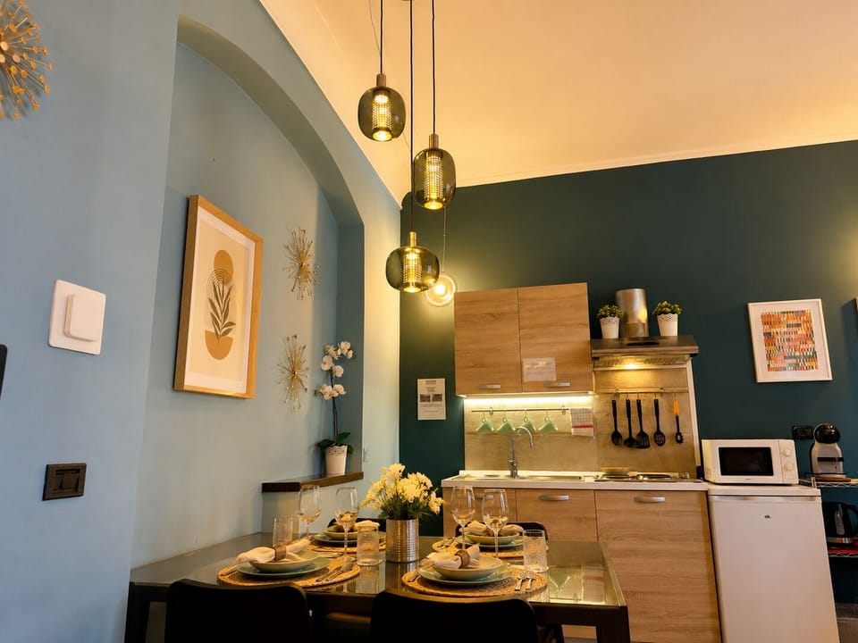 Deluxe Apartment, 1 Bedroom, Kitchenette | Living area | Flat-screen TV