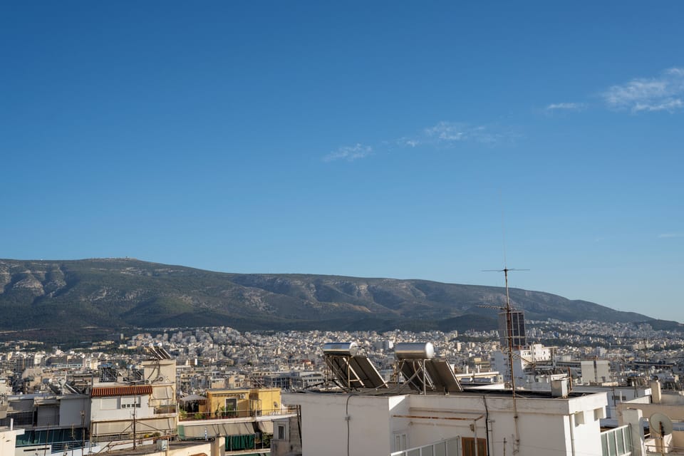 Private 7th floor balcony with panoramic Athens & mountain views 