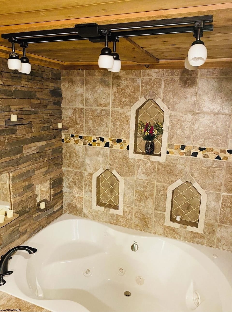 Relax after a day of skiing in the two person jacuzzi.