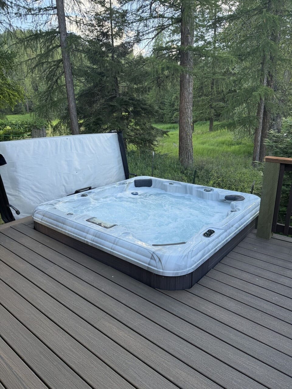 Sunken hot-tub with meadow views
