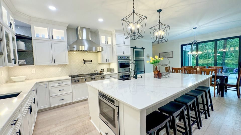 Kitchen | Stainless Steel Appliances | Island Seating & Patio Access
