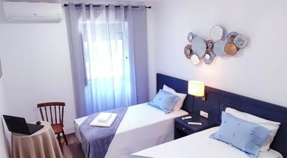 Desk, laptop workspace, blackout drapes, WiFi (free)
