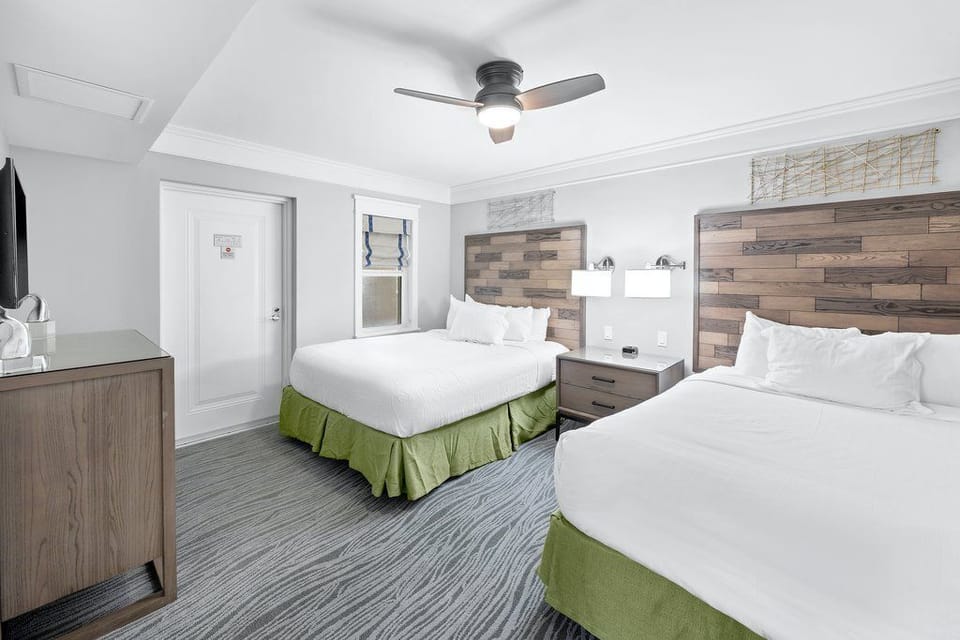 Bright bedroom with inviting décor and plenty of space to unwind after a full day of activities.