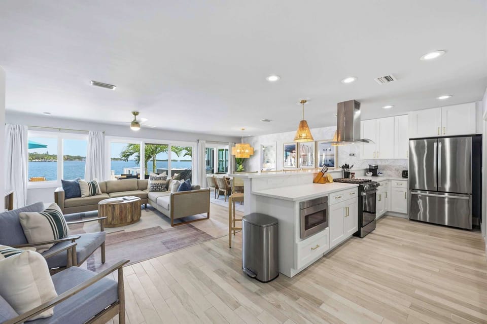 Cook, lounge, and soak in the water views — all from one stunning open-concept space.