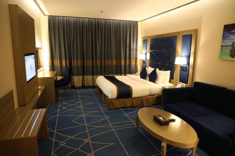 Family Suite, Balcony, City View | In-room safe, soundproofing, iron/ironing board, WiFi (free)