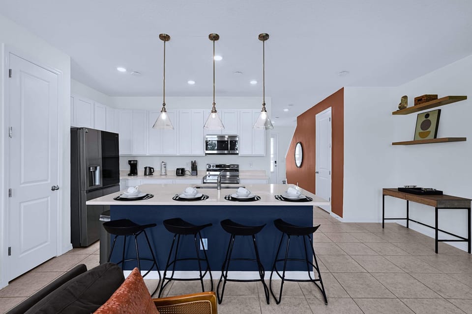 Functional kitchen island with four stools, offering dining space and additional seating