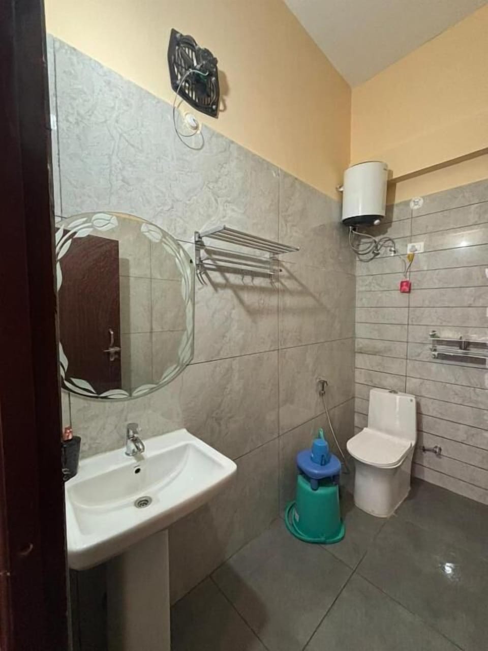 Shower, slippers, towels, toilet paper