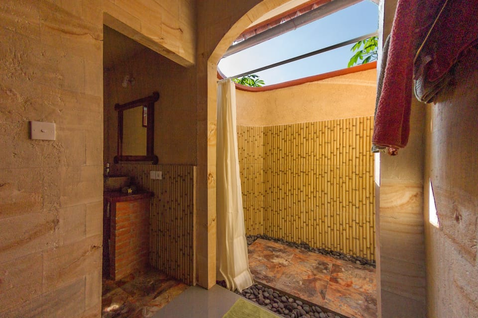 Deluxe Bungalow, 1 Double Bed, Garden View | Bathroom | Shower, free toiletries, hair dryer, towels