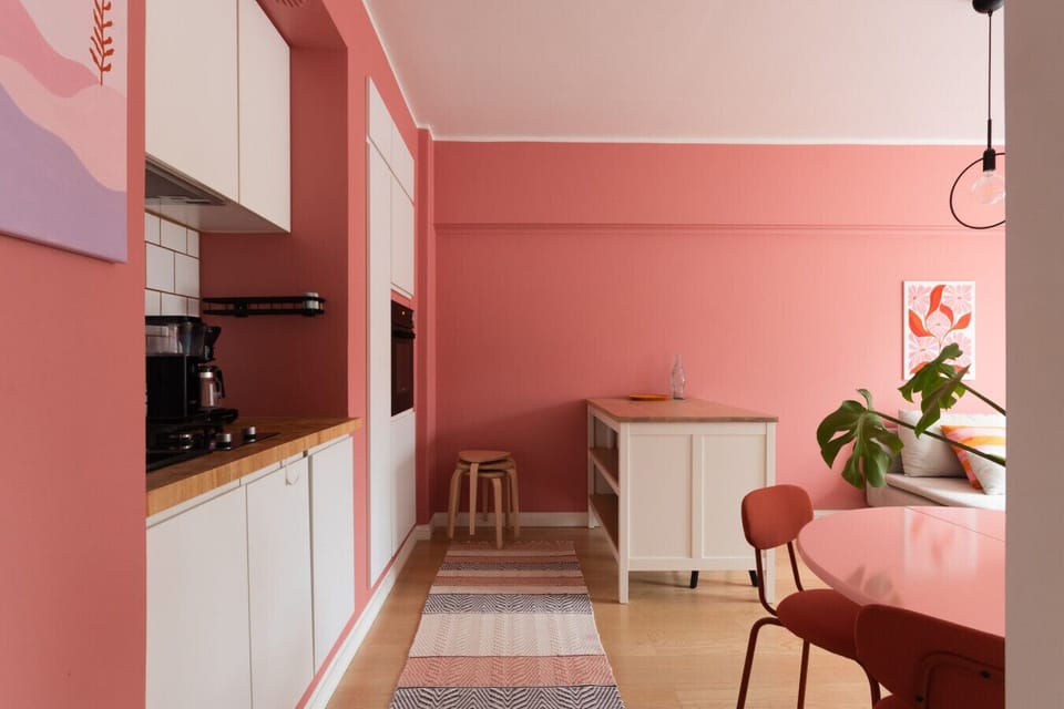 The kitchen has a small kitchen island expanding the counter space