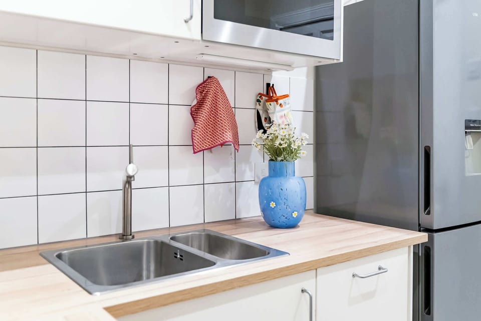 The kitchen is fully equipped to prepare a simple meal 