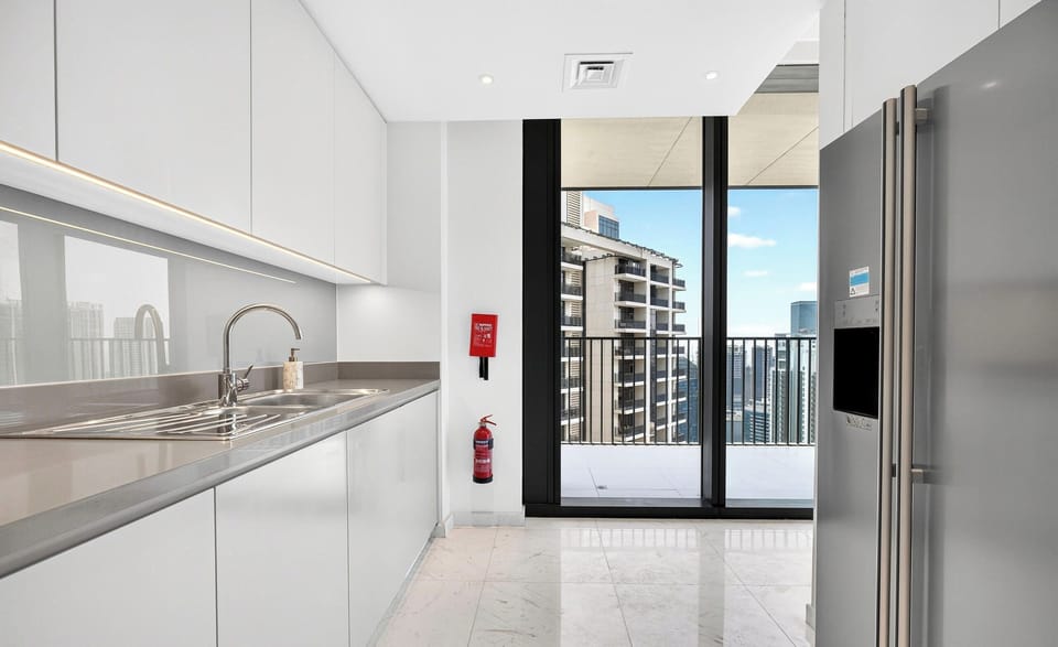 Executive Apartment, City View | Private kitchen | Coffee/tea maker