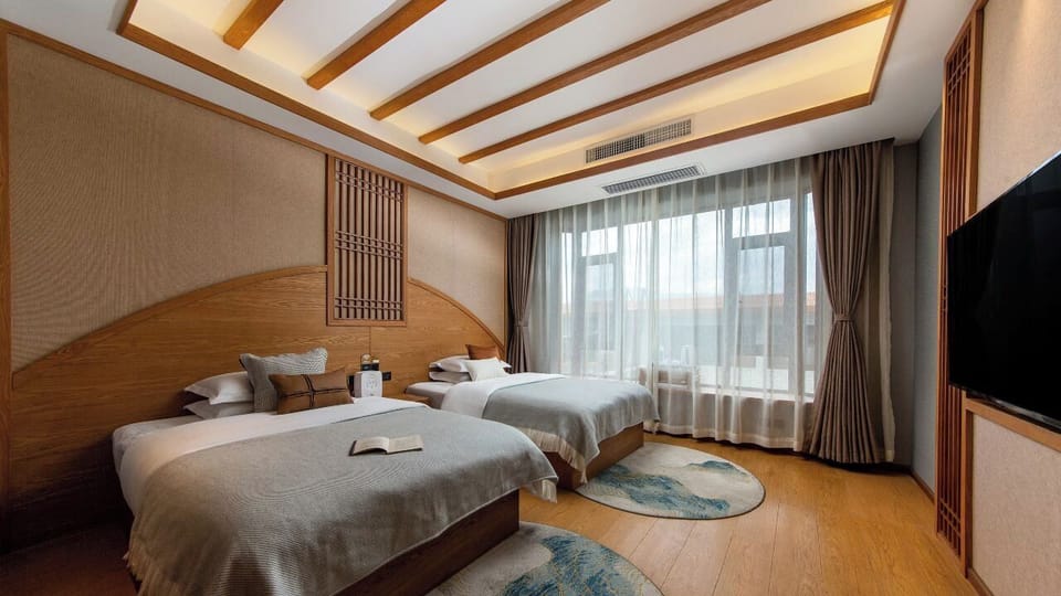 Comfort Twin Room | Premium bedding, down comforters, memory foam beds, WiFi (free)