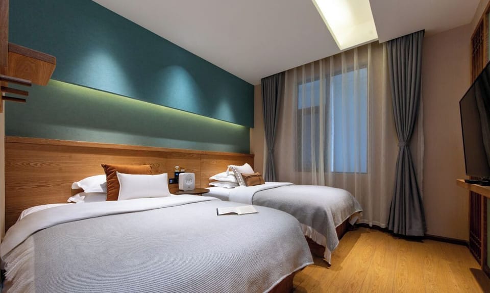 Classic Twin Room | Premium bedding, down comforters, memory foam beds, WiFi (free)