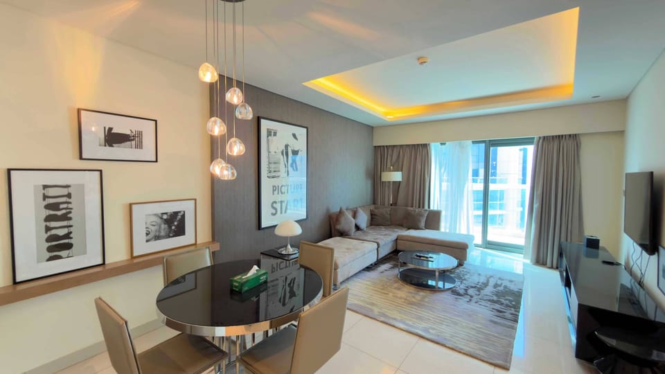 Luxury Apartment, 1 Bedroom | Living area | 32-inch flat-screen TV with cable channels