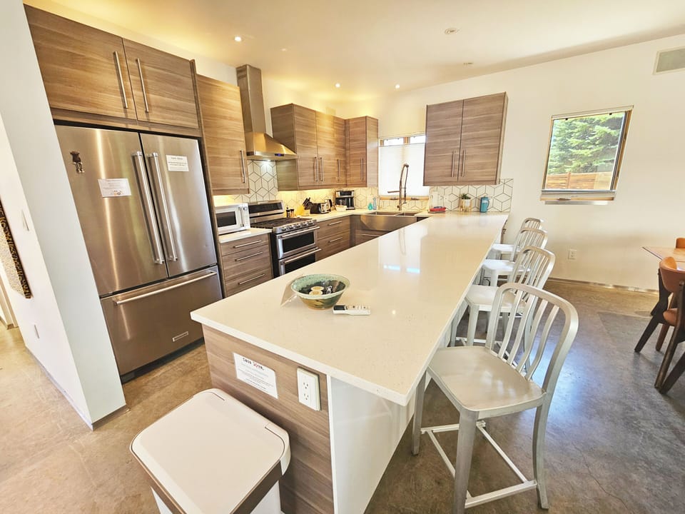 Kitchen island counter accommodates four guests.