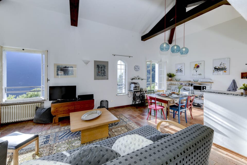 Apartment, Lake View | Living area | 30-inch TV with digital channels