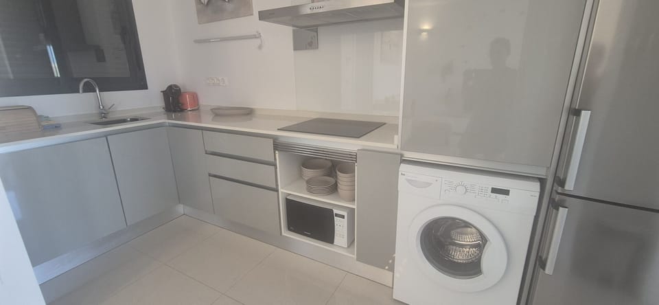 Coffee/tea maker, microwave, cookware/dishes/utensils