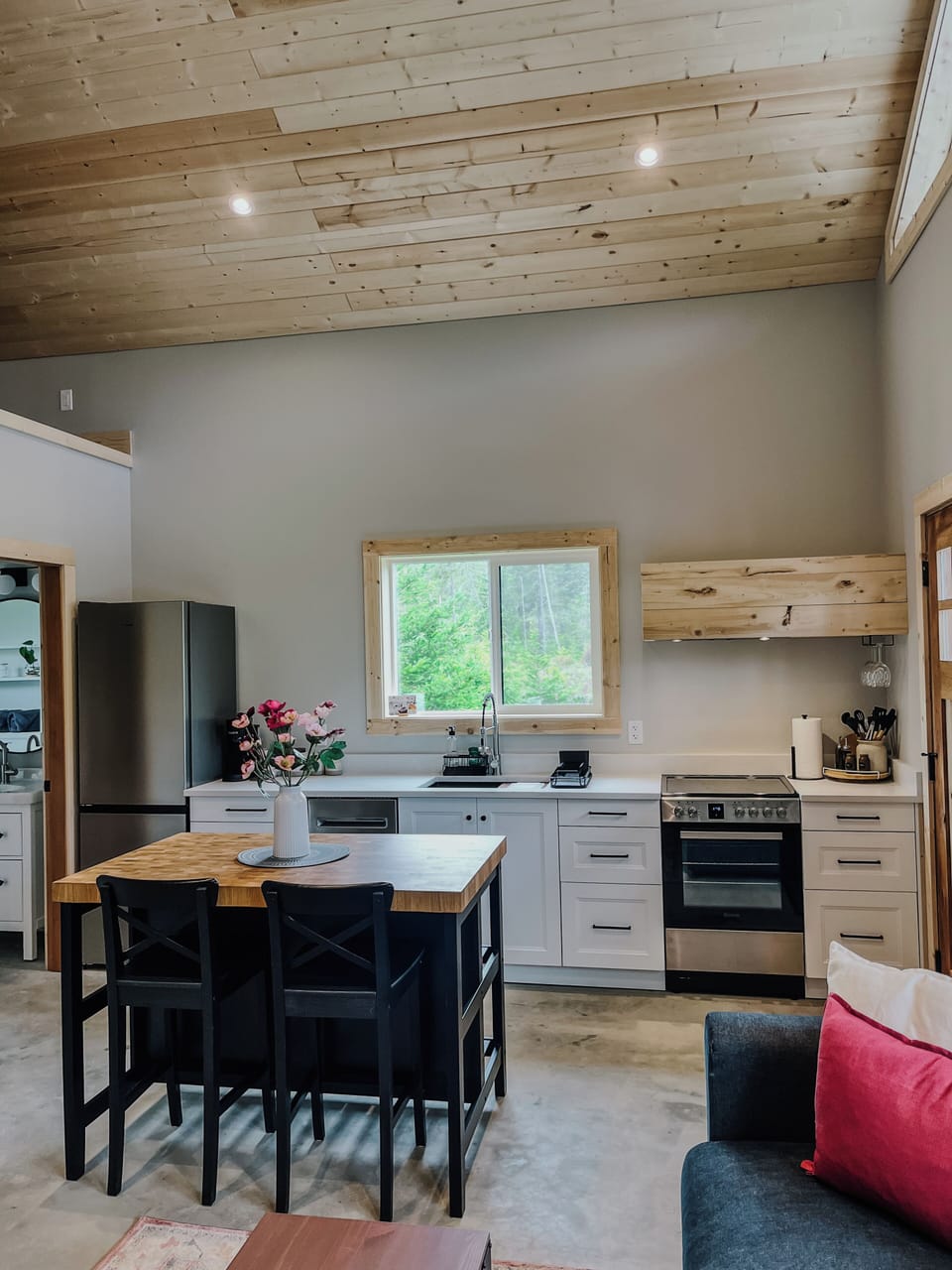 Full kitchen with stainless steel appliances and all cooking/baking/dining needs