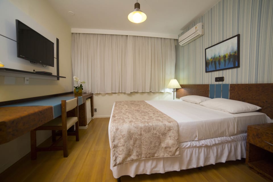 Deluxe Double Room | Minibar, desk, blackout drapes, soundproofing