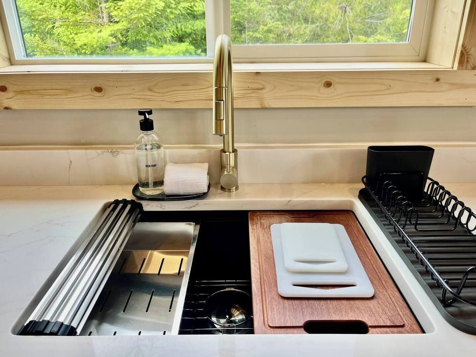 Kitchen sink with a beautiful view of the forest