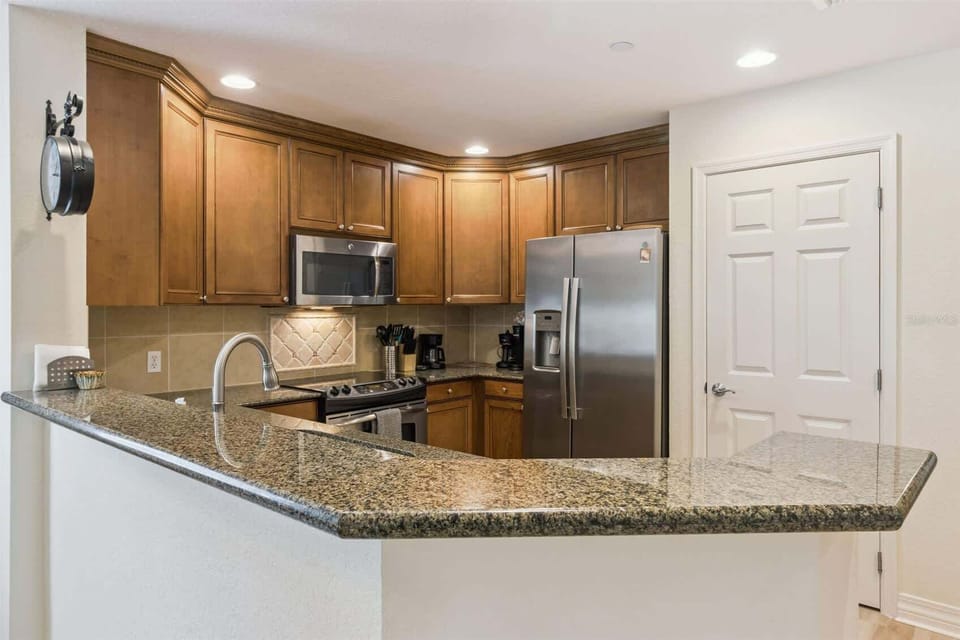 The fully equipped kitchen makes everything from quick breakfasts before Disney to family dinners at home easy and convenient.