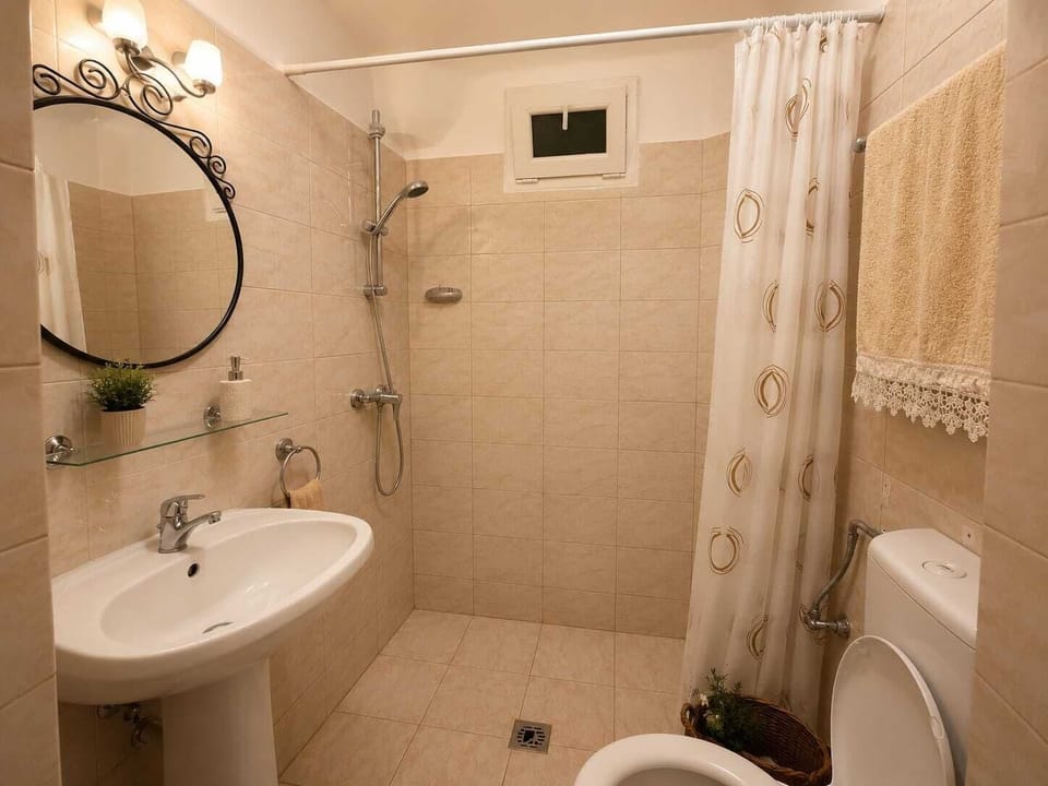 Comfort Room, Courtyard View | Bathroom | Free toiletries, towels, soap, shampoo