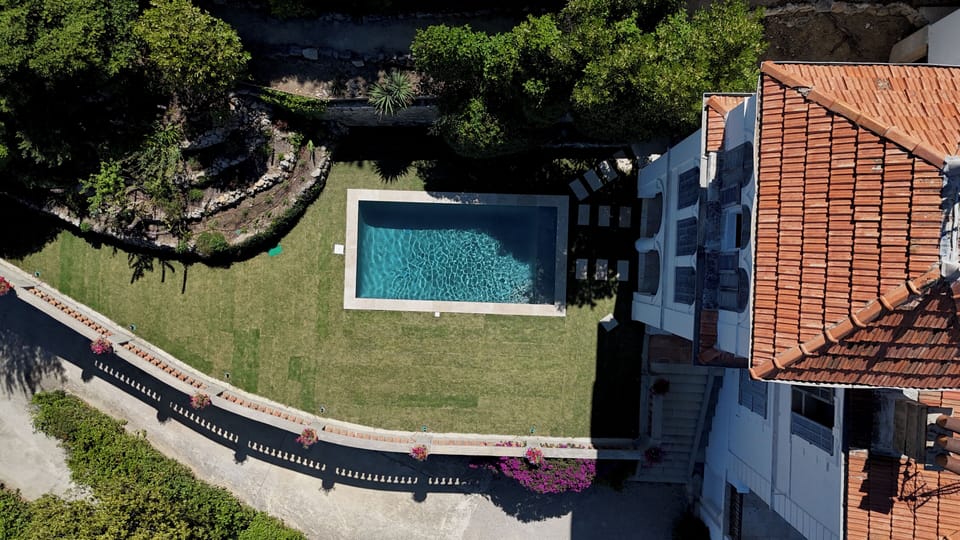 Aerial view — pool and terraced Mediterranean garden