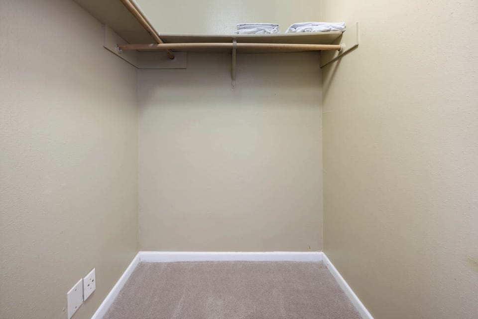 Spacious closet with ample storage and hanging space for your convenience.