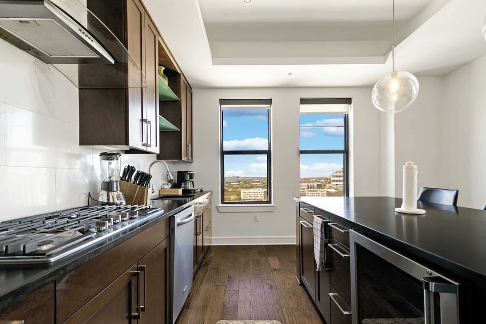 Chef's kitchen with gas range, spacious counters, and modern finishes