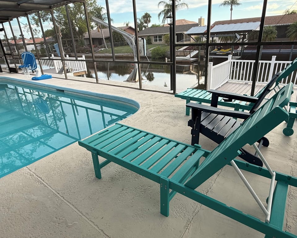 Lounge poolside and catch some sun while watching the wildlife in the canal