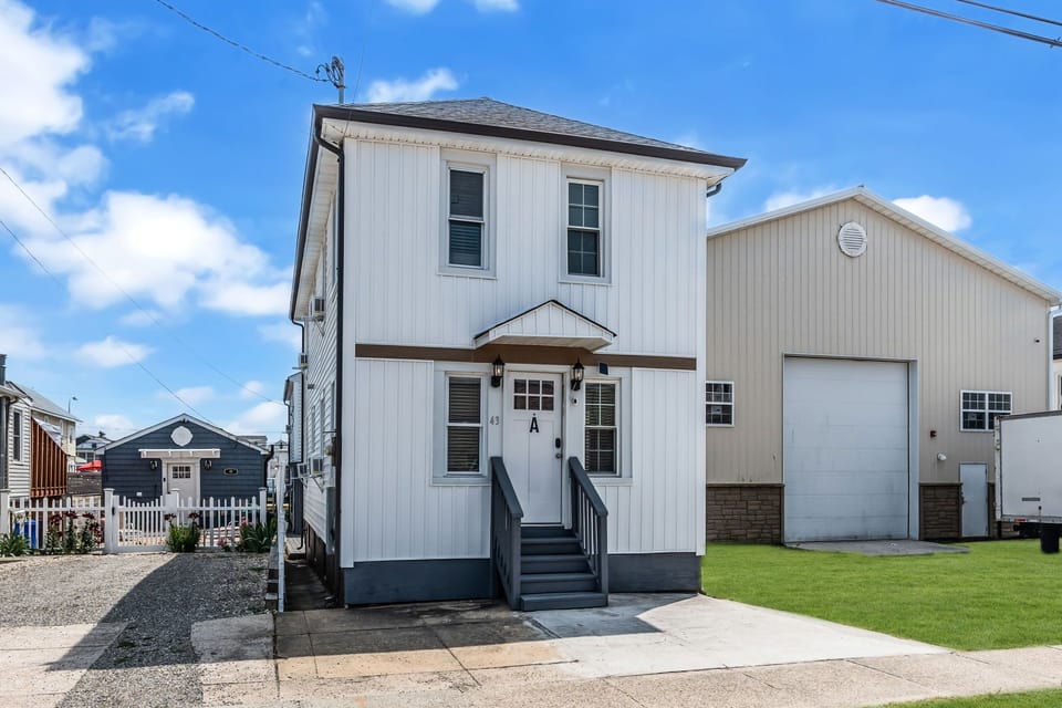 Bright two-story home with private entry and clean, welcoming exterior