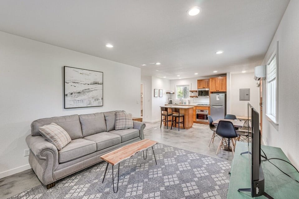 Living Room | Sofa Seating, Coffee Table & Open Kitchen