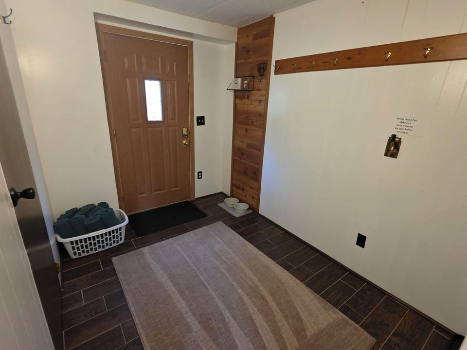 Door to the hot tub and towels 