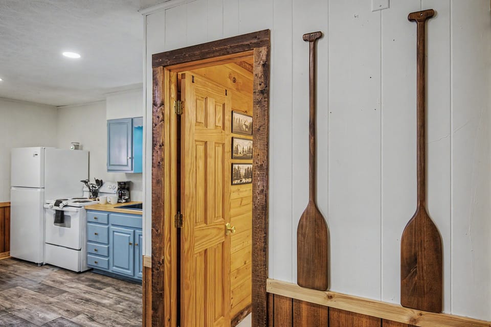 Kitchen: Whip up delicious meals in a bright, inviting space with charming wooden accents!
