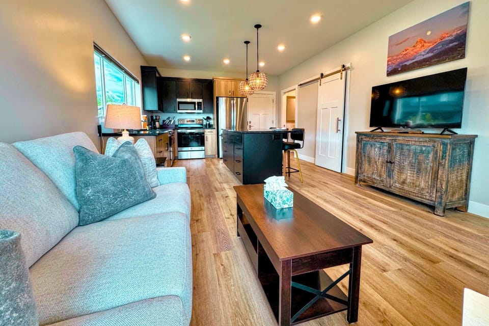 Sink in after a day on the mountain — the kitchen and living space flow together.