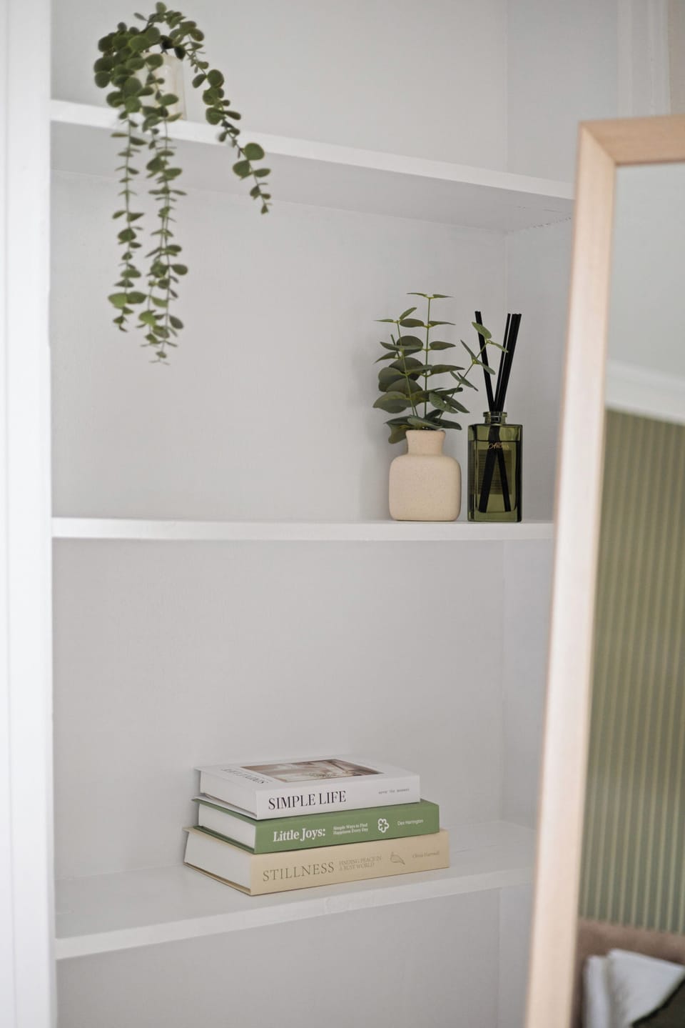 Thoughtful decorative touches and greenery add a welcoming, homely feel to the property’s bright interior.
