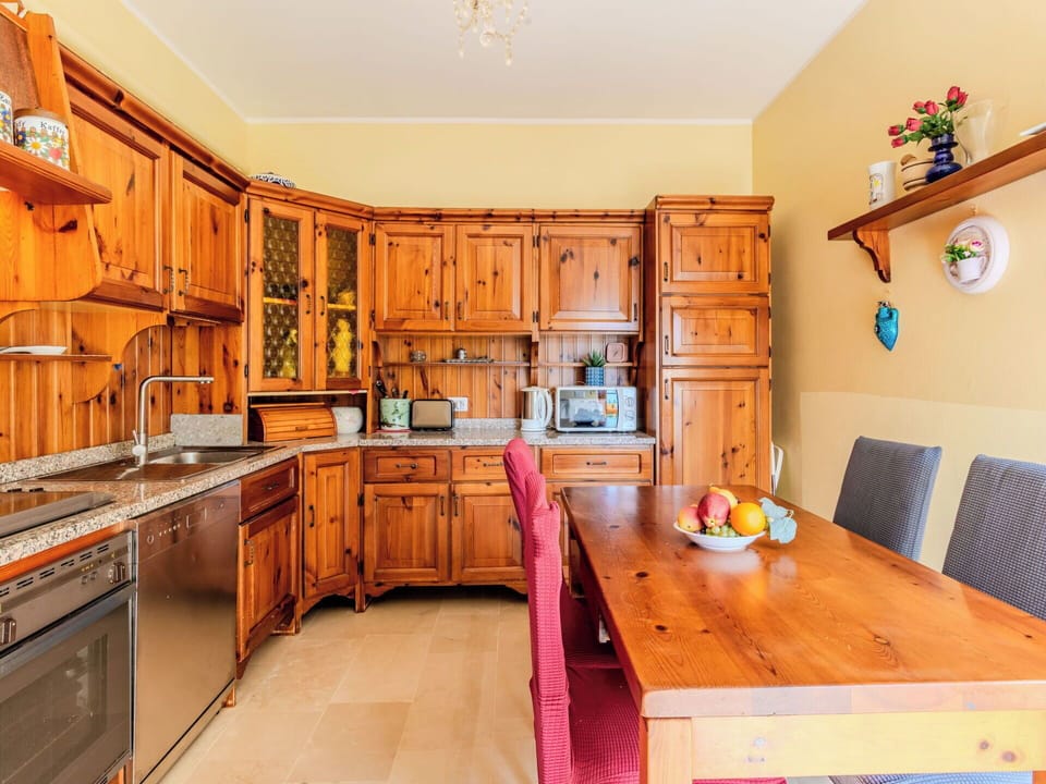 Cabinetry, Kitchen, Furniture, Interior Design, Wood, Flooring, Countertop, Cupboard, Drawer, Floor
