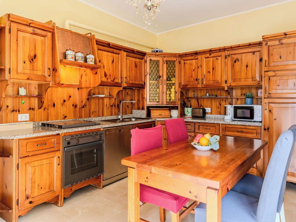 Cabinetry, Kitchen, Furniture, Wood, Flooring, Interior Design, Kitchen Appliance, Cupboard, Countertop, Drawer