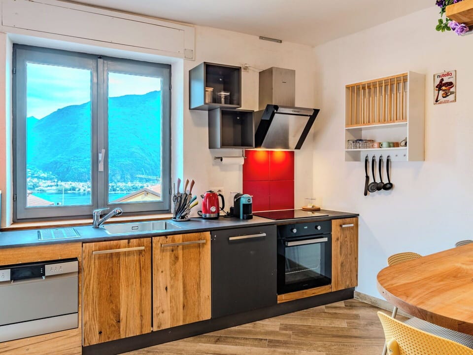Furniture, Cabinetry, Kitchen, Wood Stain, Mountain Range, Countertop, Hardwood, Drawer, Alps, Cupboard