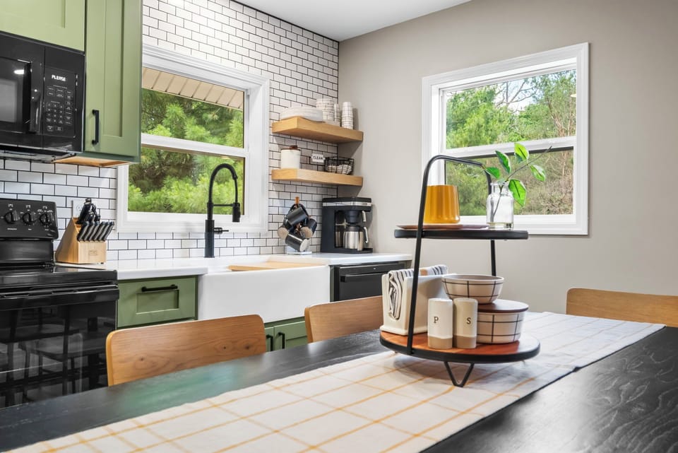 Farmhouse sink, coffee station and open shelving