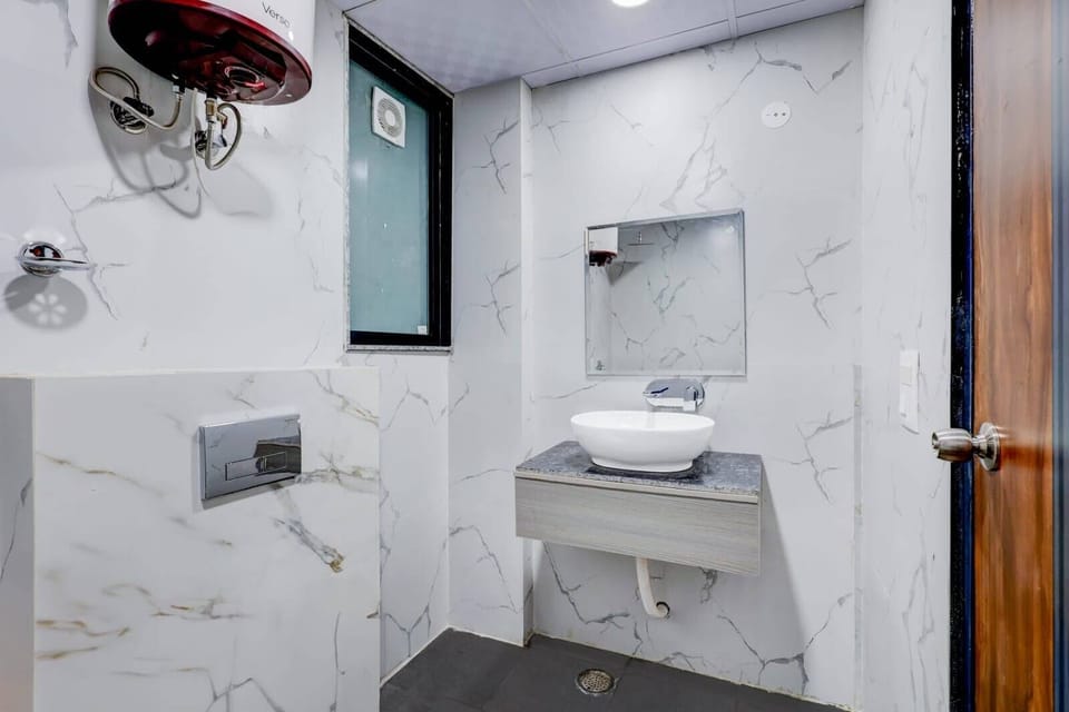 Shower, free toiletries, slippers, towels