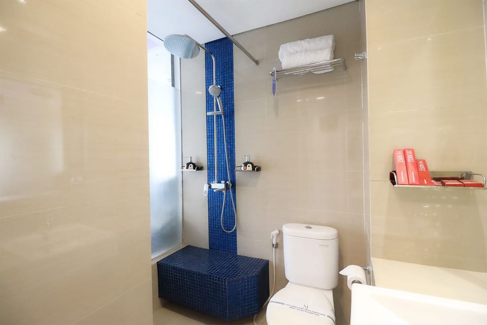 Shower, free toiletries, hair dryer, bathrobes