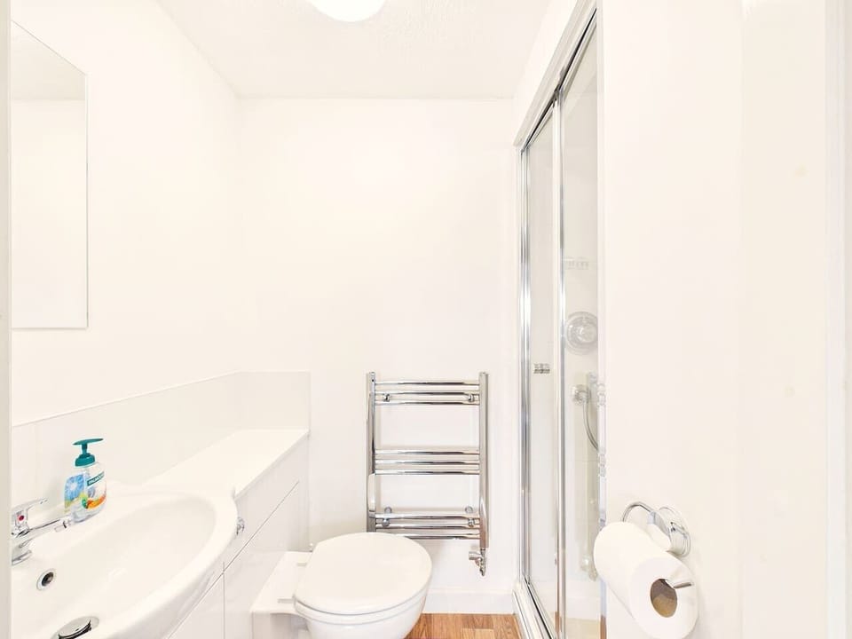 Freshen up in the smart, modern bathroom.