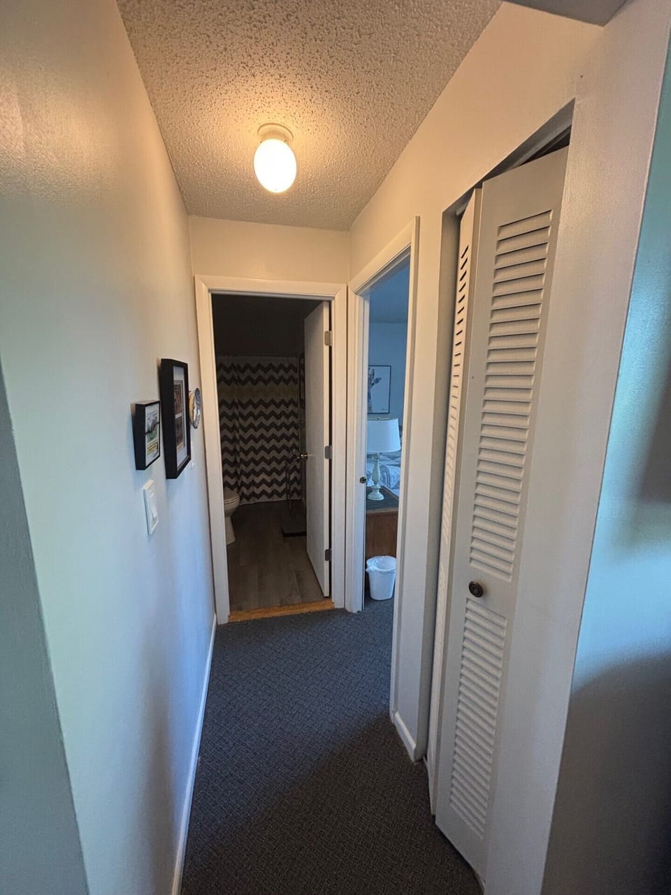 Hall wo second bedroom and second full bathroom